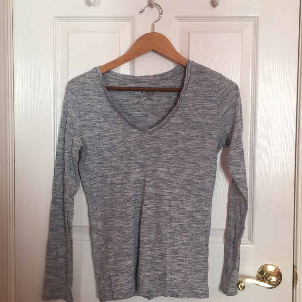 Light blue v-neck.